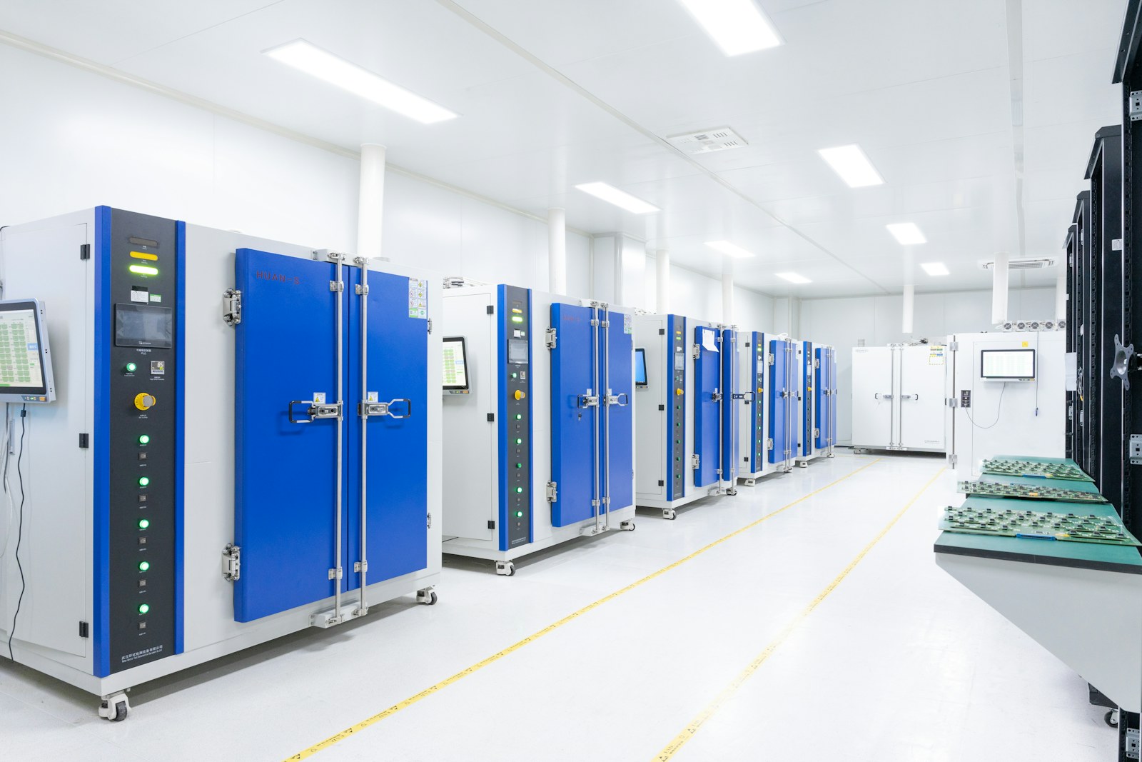 a row of blue and white lockers in a room