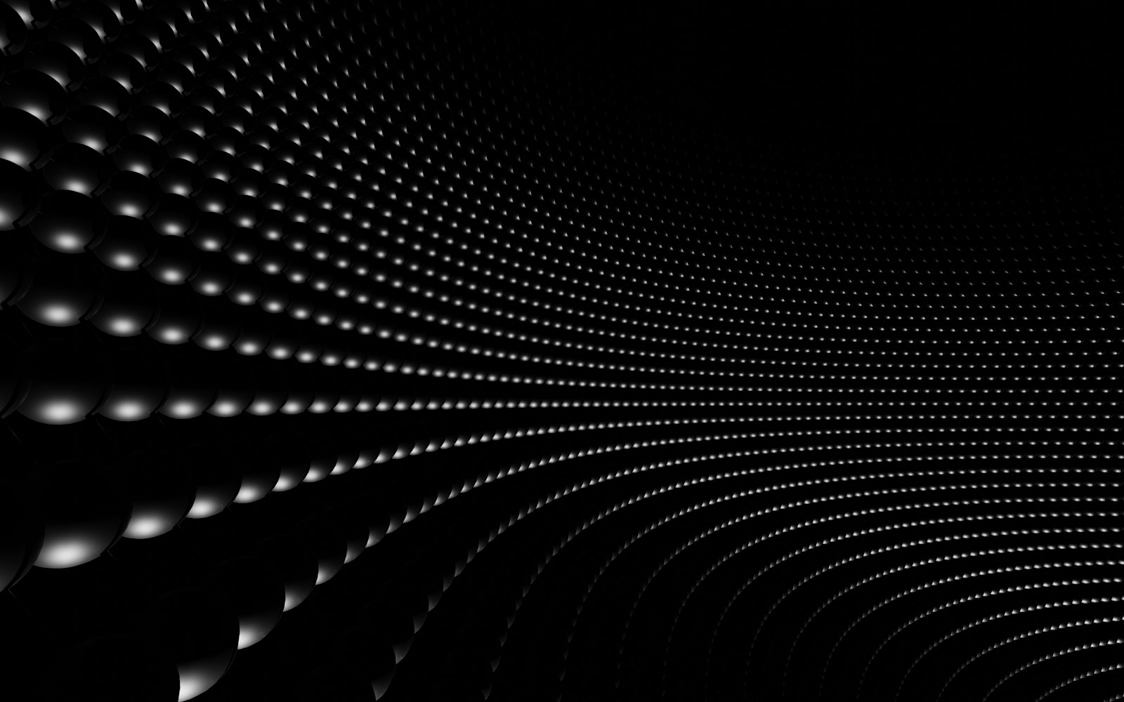 A black and white photo of a tunnel of lights