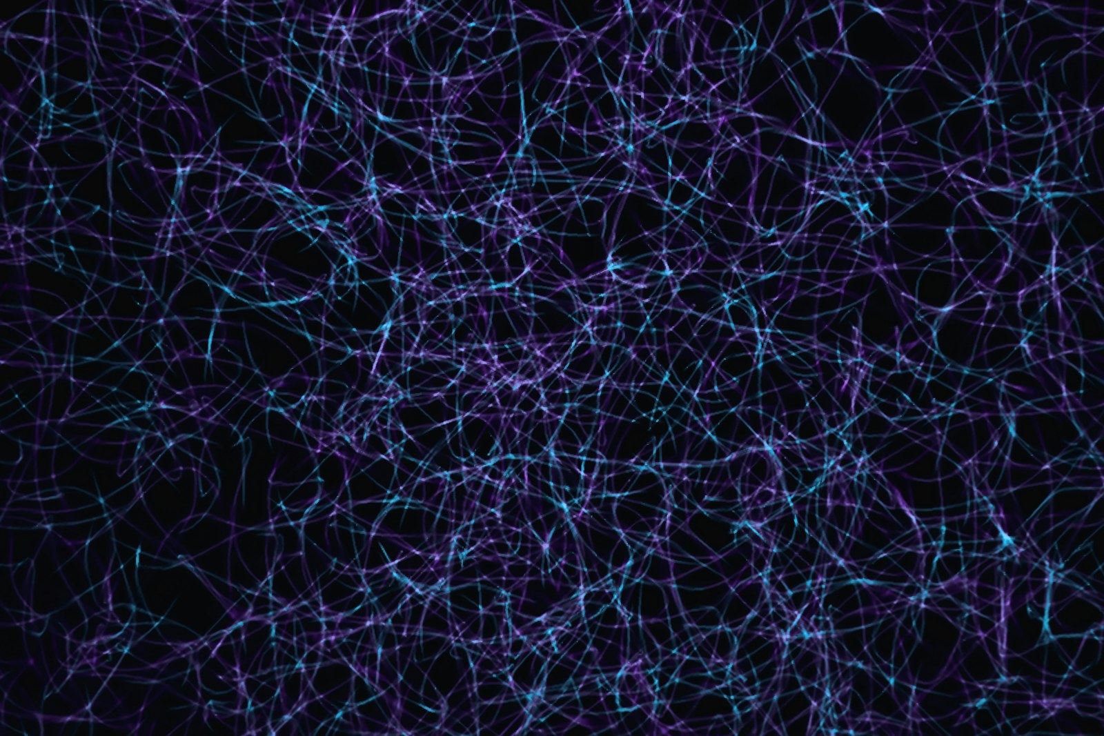 a dark blue background with lots of lines