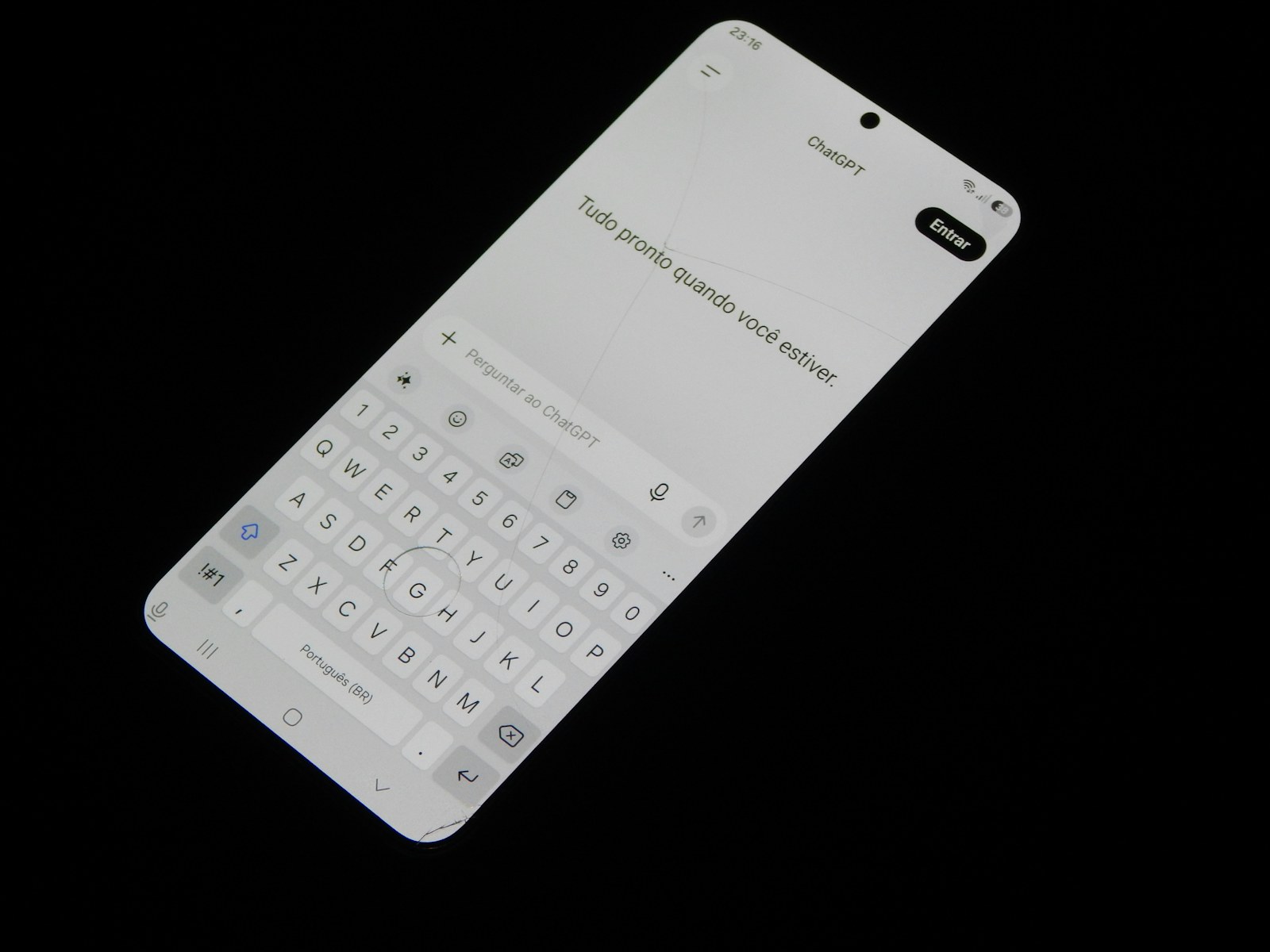 A smartphone screen displaying a chat interface with a virtual keyboard on black