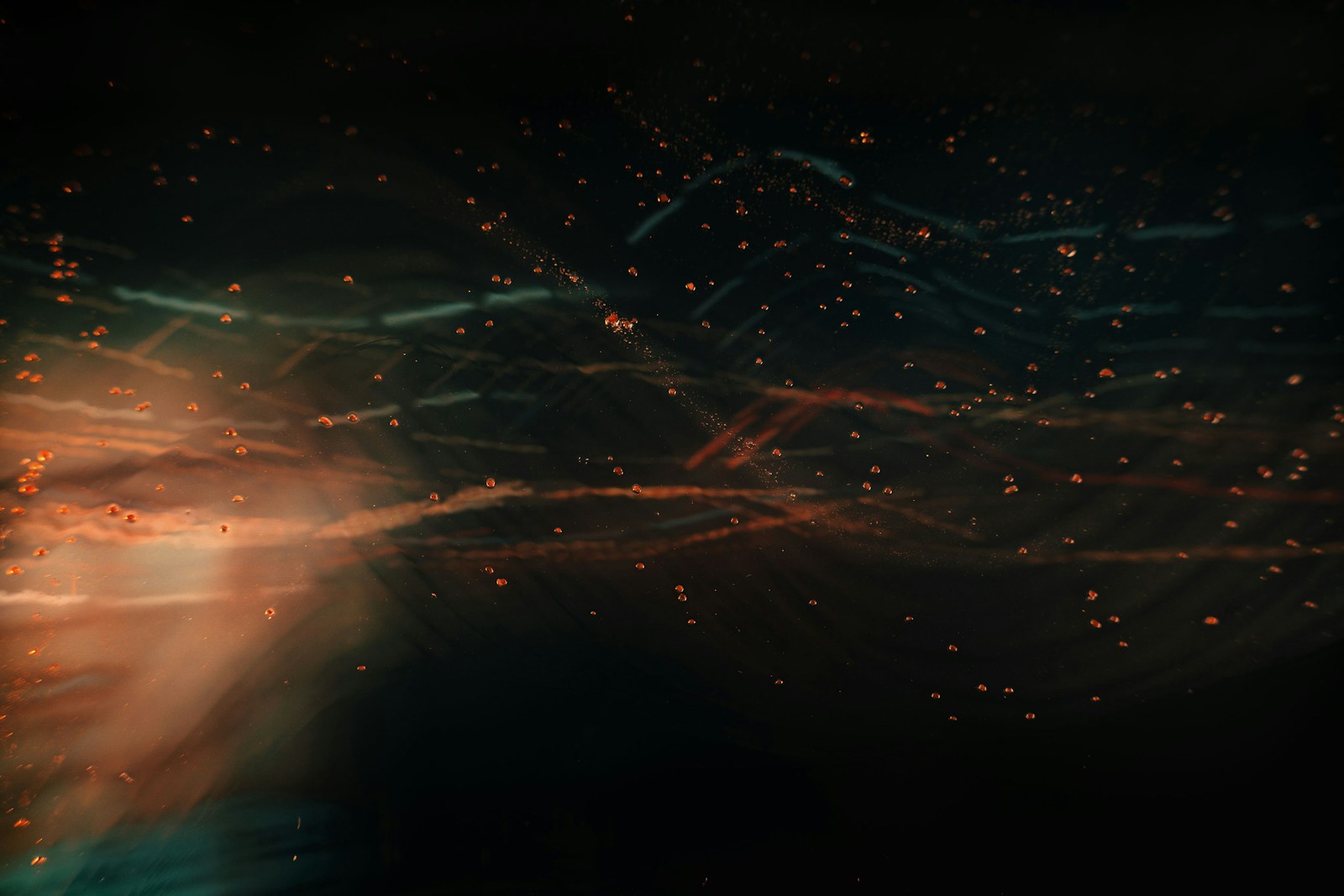 a blurry image of a bright orange and blue light